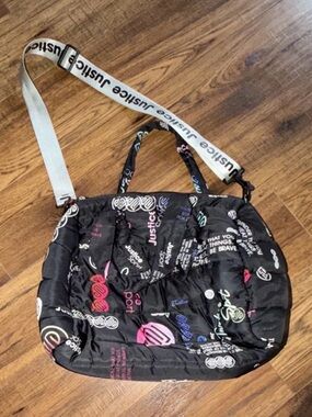 Justice Black Quilted Tote with White Branded Strap and Multicolor Print